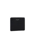 Saint Laurent black calf leather Bos Taurus wallet opened to show card slots and interior design.