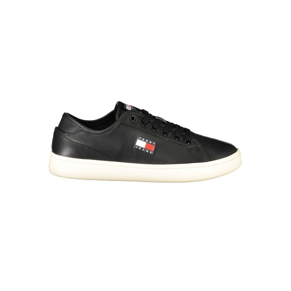 Tommy Hilfiger black polyurethane women's sneaker with white sole and stylish design, casual footwear for everyday wear.