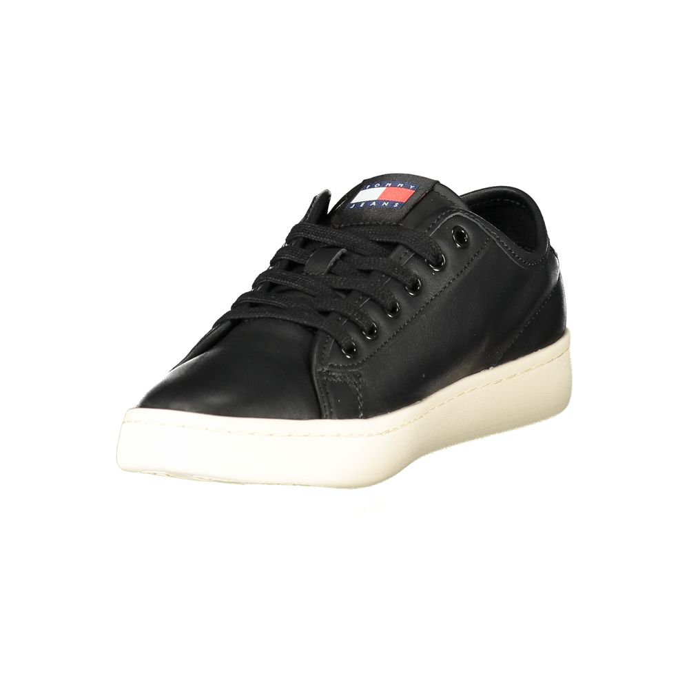 Black Tommy Hilfiger women's sneaker made of polyurethane, featuring a sporty design and casual style.