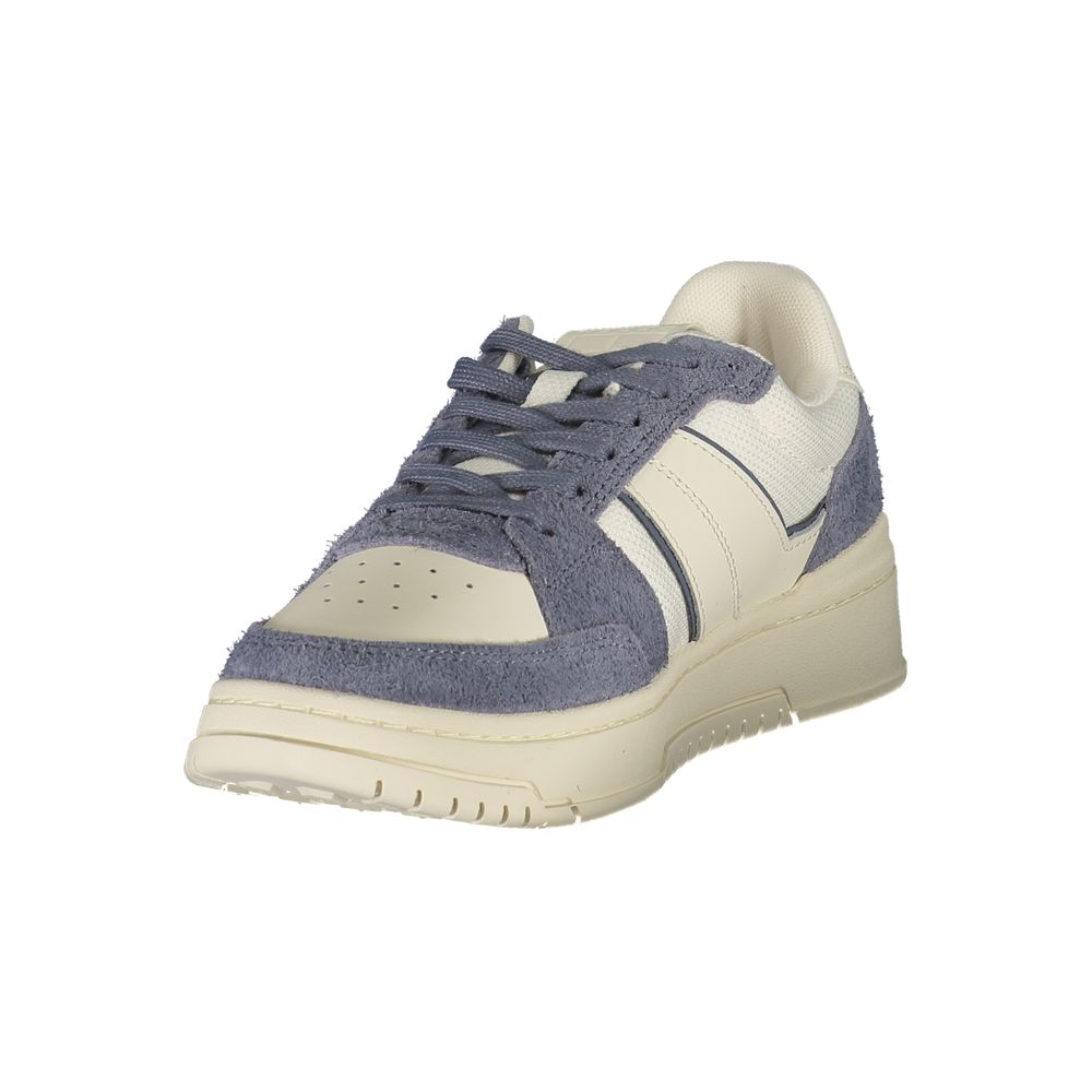 White leather men's sneaker by Tommy Hilfiger with sporty design, featuring laces and a clean, stylish appearance.