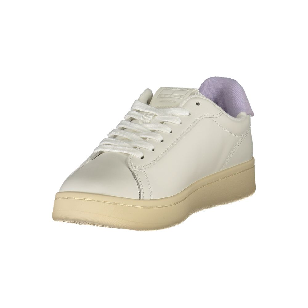 White Tommy Hilfiger women's sneaker with polyurethane material and casual design, featuring a lace-up front and brand logo accents.