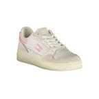 White Tommy Hilfiger women's sneaker made of polyurethane, featuring a sleek design and casual style.