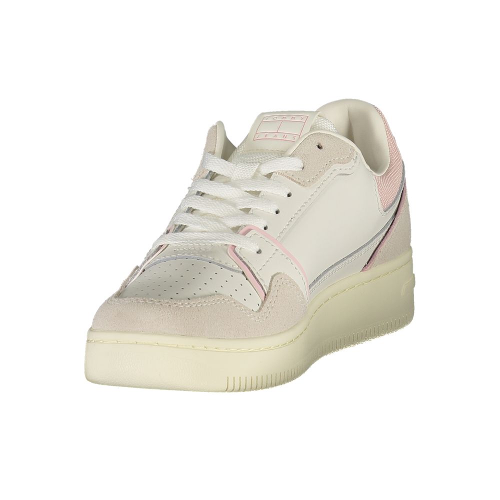 White Tommy Hilfiger women's polyurethane sneaker with sleek design and laces, side logo detail, and sporty sole.
