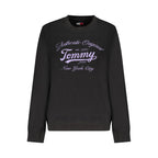 Black cotton women's sweatshirt by Tommy Hilfiger with logo detail, displayed on a hanger against a plain background.