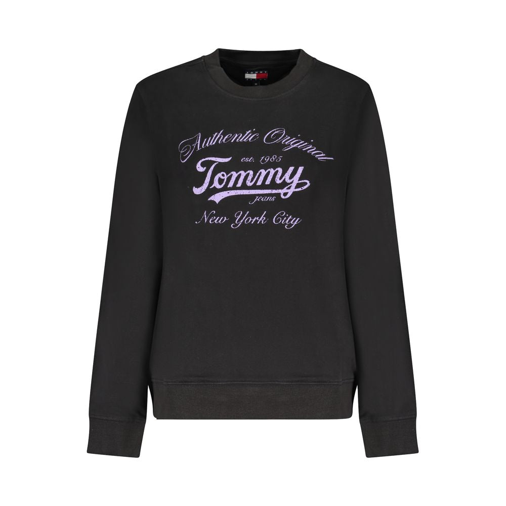 Black cotton women's sweatshirt by Tommy Hilfiger with logo detail, displayed on a hanger against a plain background.