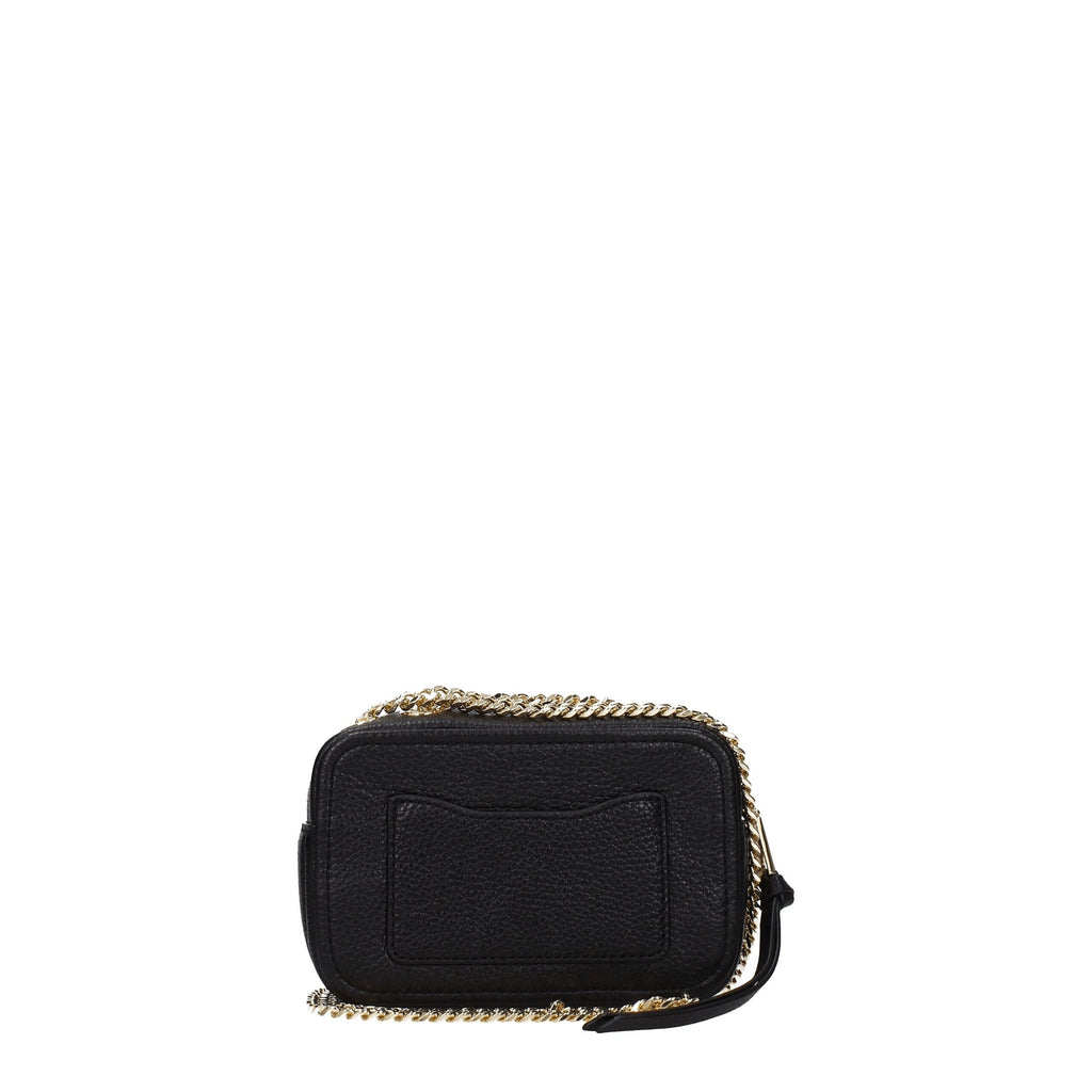 Black leather crossbody bag by Marc Jacobs with adjustable strap and sleek design.