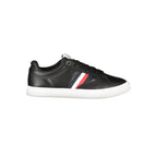 Black Tommy Hilfiger men's polyester sneaker with white sole and branding, viewed from the side.