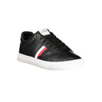 Black Tommy Hilfiger men's polyester sneaker with white sole and logo detail, positioned on a plain background.