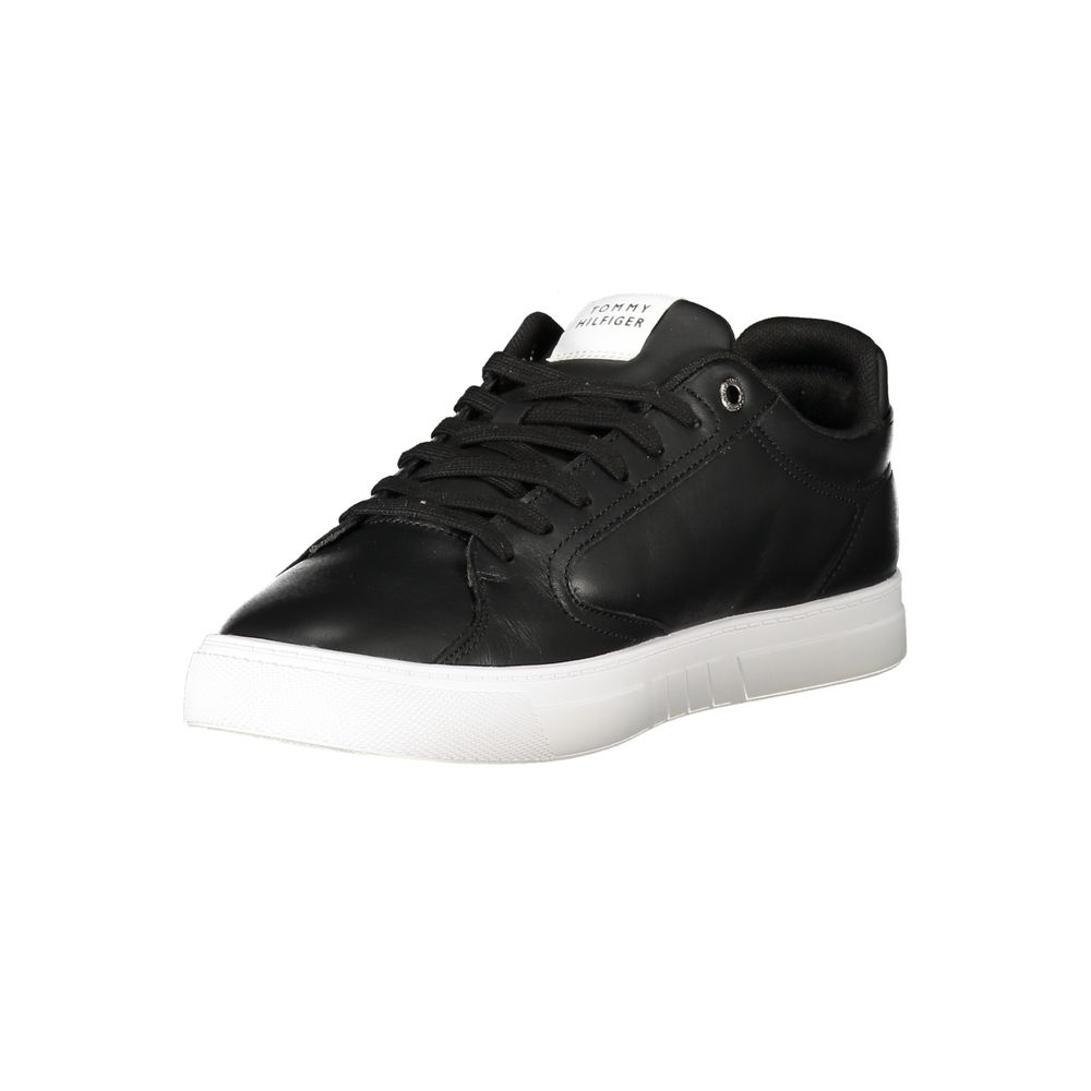 Black Tommy Hilfiger men's sneaker made of polyester with a sleek design and branded logo on the side.