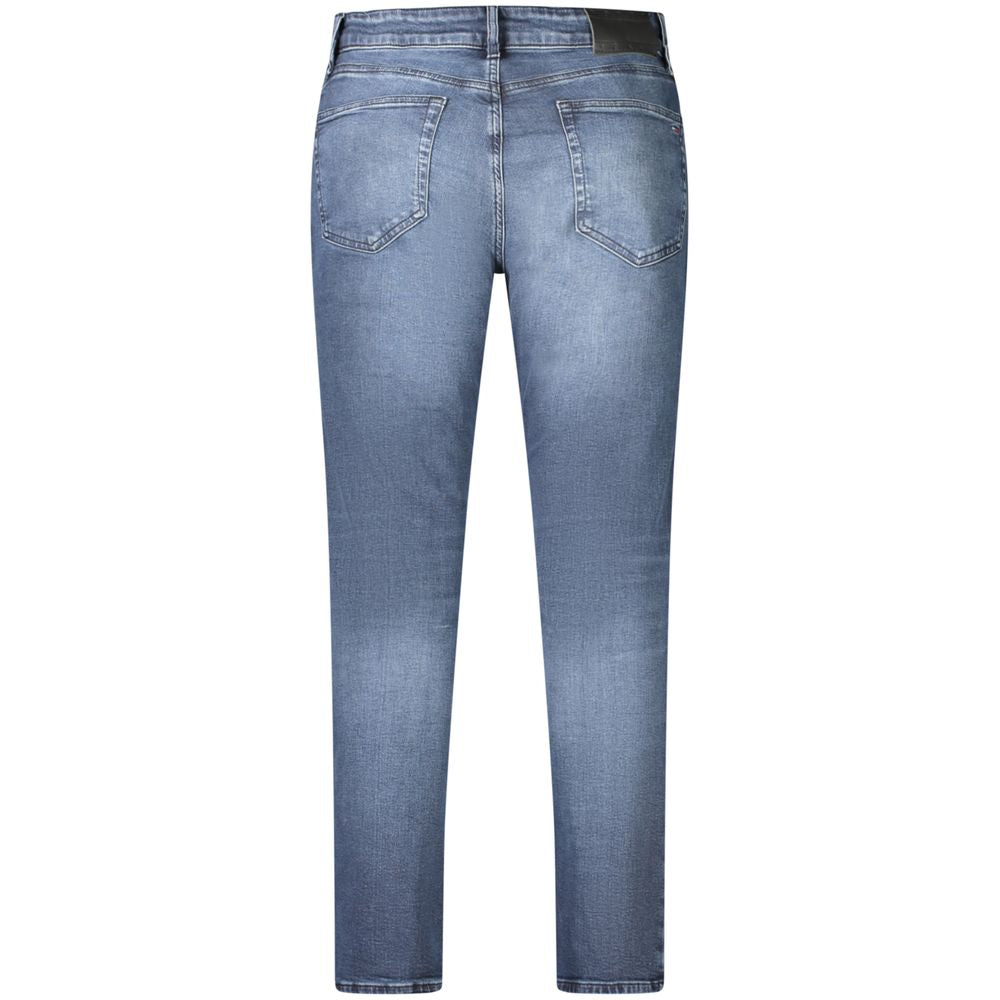 Tommy Hilfiger men's blue cotton jeans with classic five-pocket design and straight-leg fit, displayed on a neutral background.