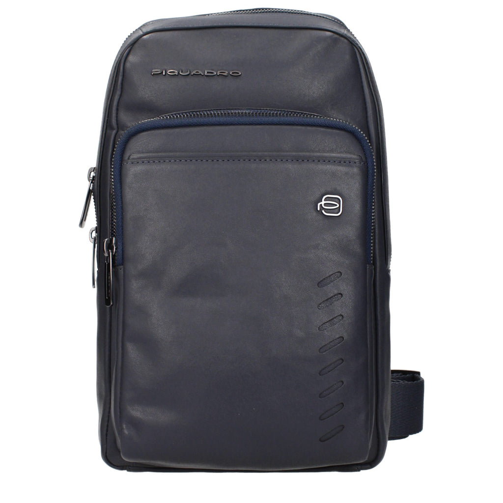 Piquadro blue leather crossbody bag with adjustable strap and sleek design, ideal for carrying essentials comfortably.