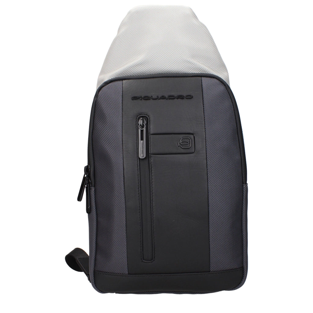 Gray fabric Piquadro backpack with adjustable straps and multiple compartments, designed for everyday use.