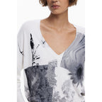 White Desigual women's viscose jersey top with a relaxed fit and subtle design details, perfect for casual wear.