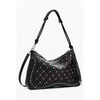 Desigual black polyurethane women's mini bag with gold-tone hardware and adjustable shoulder strap on a neutral background.