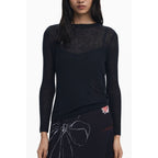 Desigual black polyester women's dress shown on a model, featuring a stylish fit and casual design.