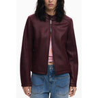 Red Desigual women's polyester jacket with a stylish design, shown on a hanger against a plain background.