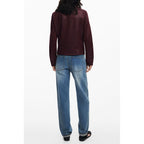 Red polyester women's jacket by Desigual, featuring a stylish design and casual fit, shown on a model.