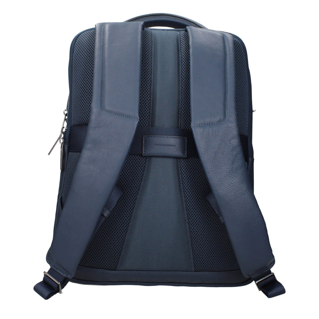 Piquadro blue leather backpack with adjustable straps and multiple compartments, stylish and functional for everyday use.