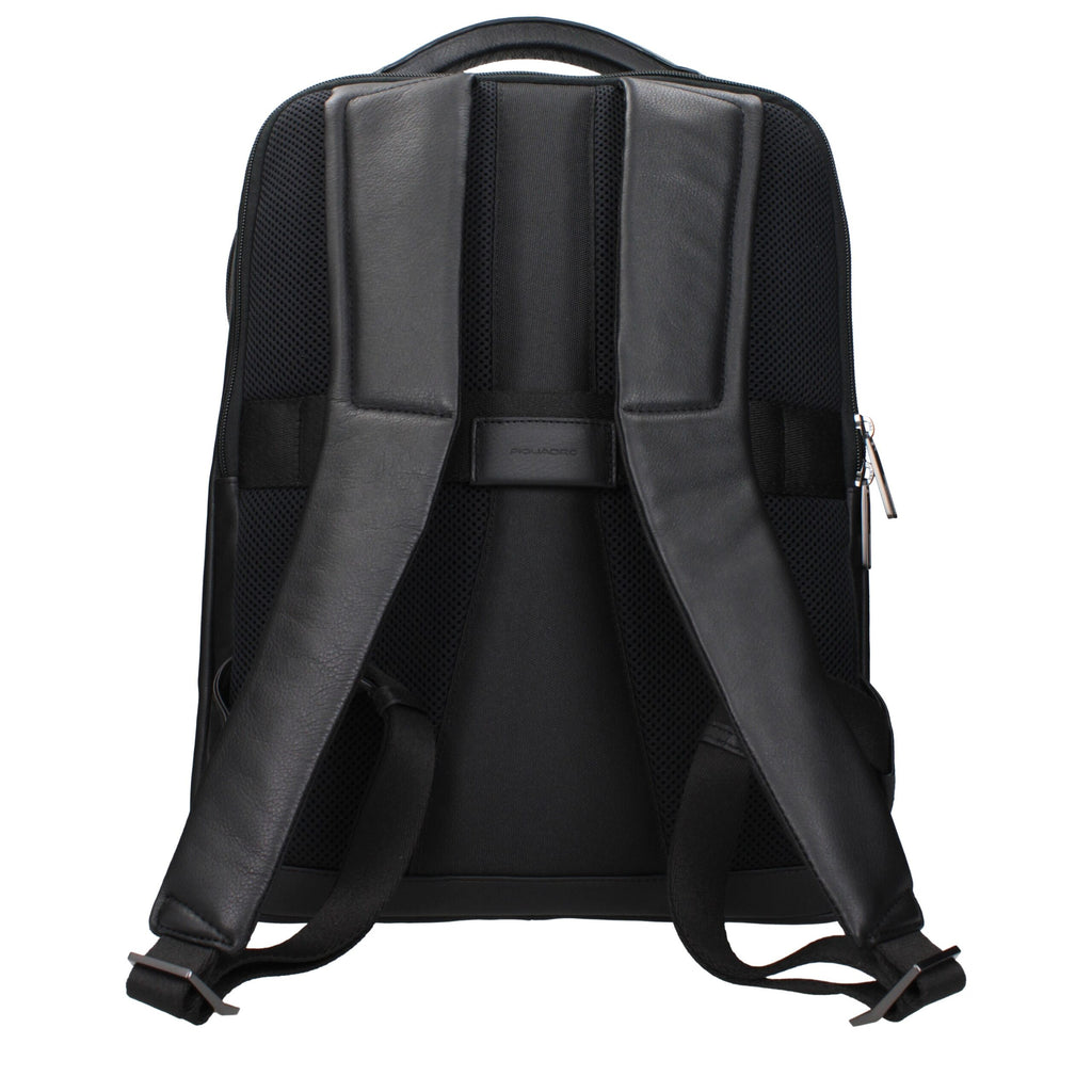 Piquadro black leather backpack with adjustable shoulder straps and multiple compartments, stylish and durable for everyday use.