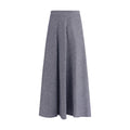 Sara Roka blue cotton midi skirt shown on model, featuring a flowy design and high waist, perfect for casual or dressy occasions.