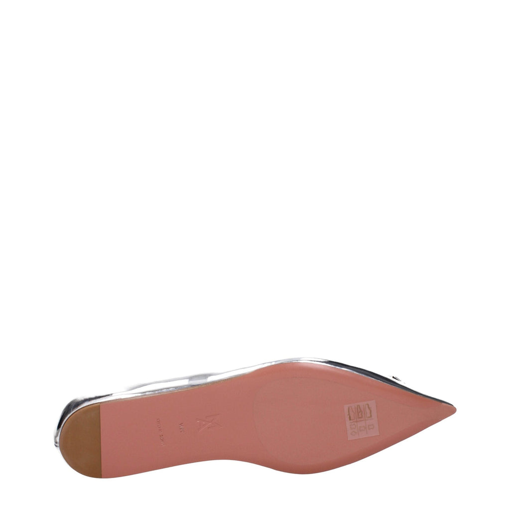 Gray leather ballet flats by Amina Muaddi, featuring sleek design and comfortable fit, shown on a plain background.