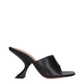 Black leather stiletto heel sandals by Amina Muaddi, featuring sleek design and elegant straps for stylish footwear.