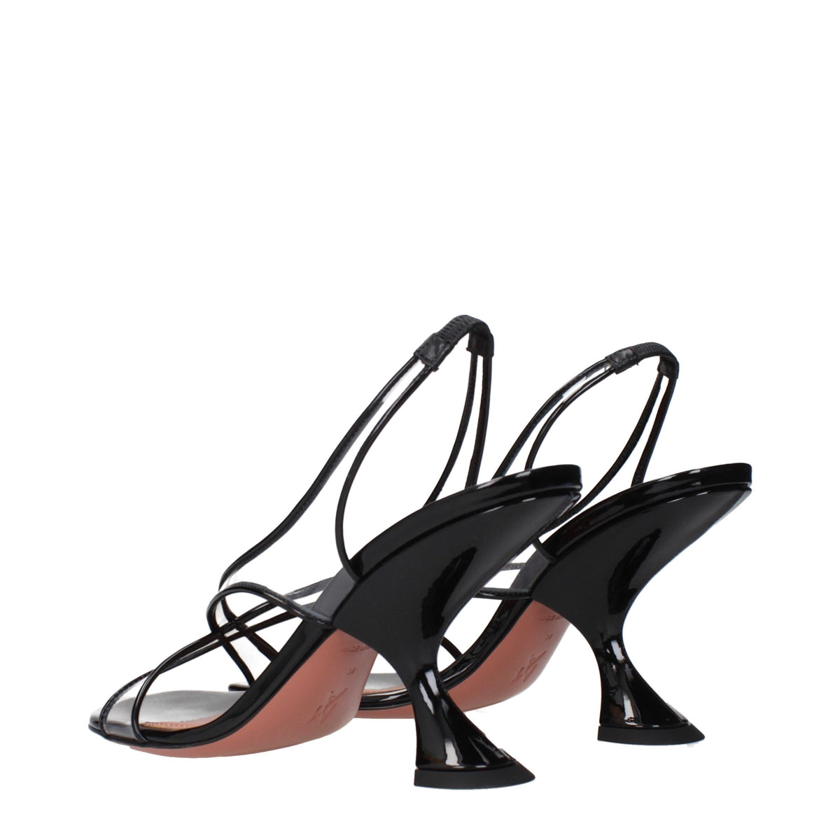 Black leather stiletto heel sandals by Amina Muaddi, featuring sleek strap design and elegant high heel for stylish occasions.