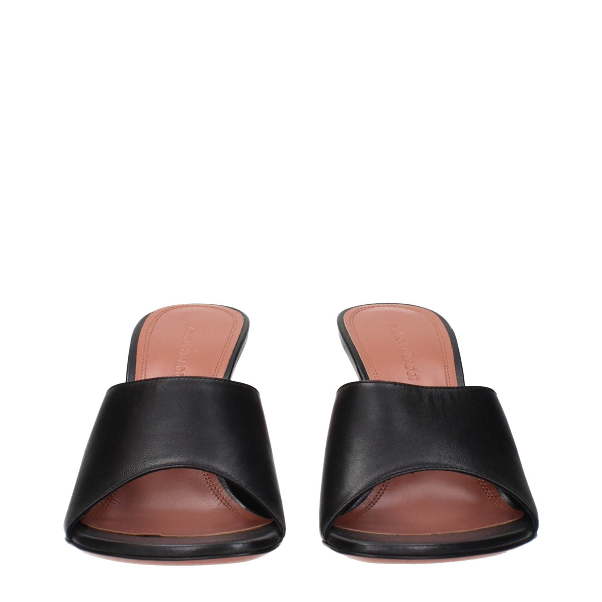 Black leather stiletto heel sandals by Amina Muaddi with sleek straps and pointed toes, stylish and elegant footwear.