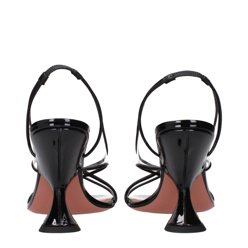 Amina Muaddi black leather stiletto heel sandals with open toes and ankle straps, stylish and elegant footwear for women.