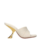 Amina Muaddi beige fabric slippers with pointed toes and elegant design, perfect for stylish indoor or casual wear.