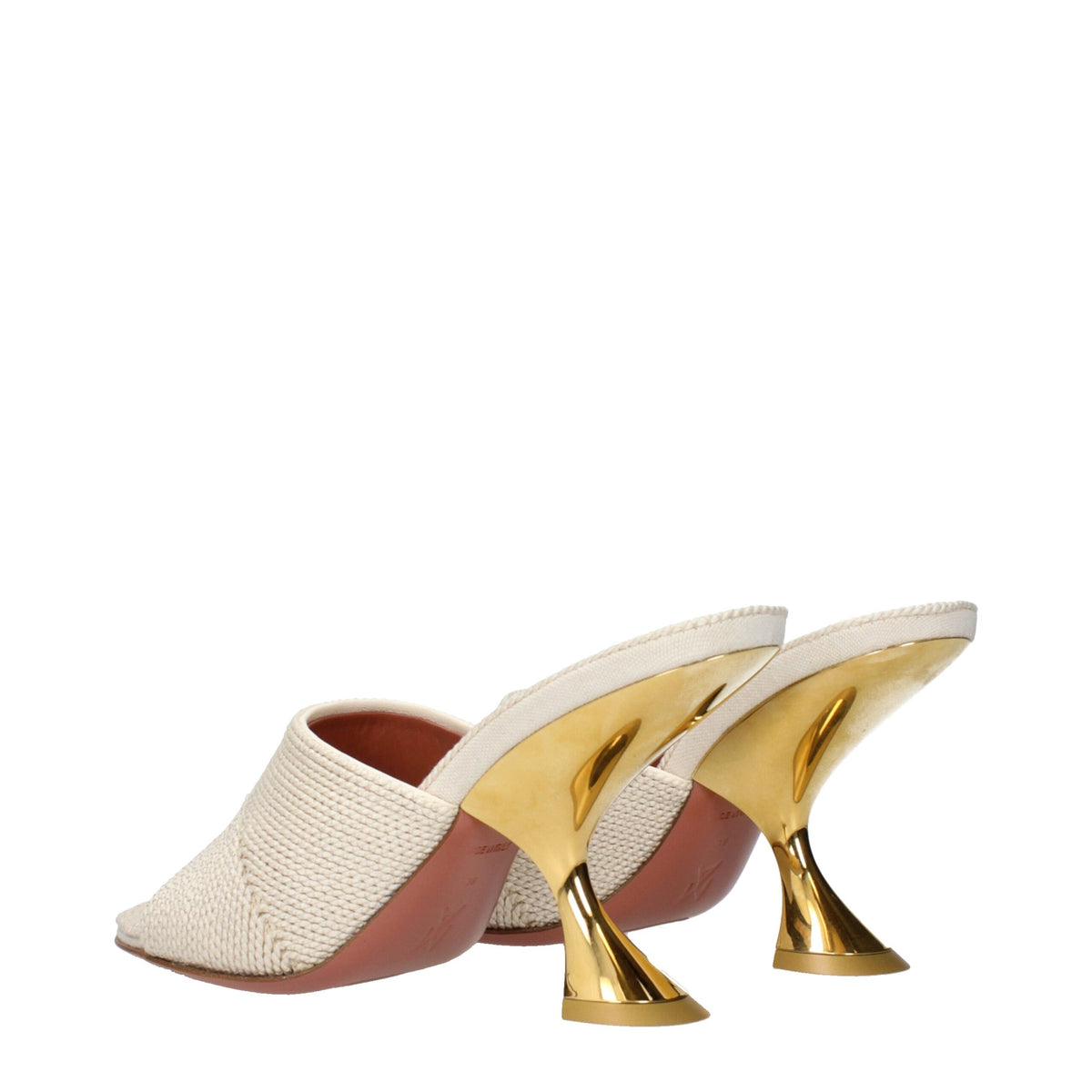 Amina Muaddi beige fabric slippers with slip-on design and plush interior for comfortable wear.
