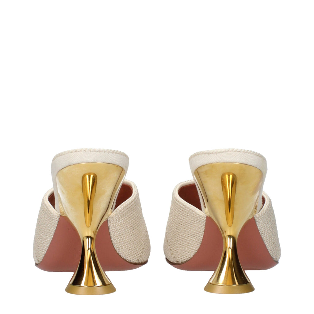 Amina Muaddi beige fabric slippers with open-toe design and plush inner lining for stylish comfort.