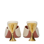 Amina Muaddi beige fabric slippers with open-toe design and plush inner lining for stylish comfort.