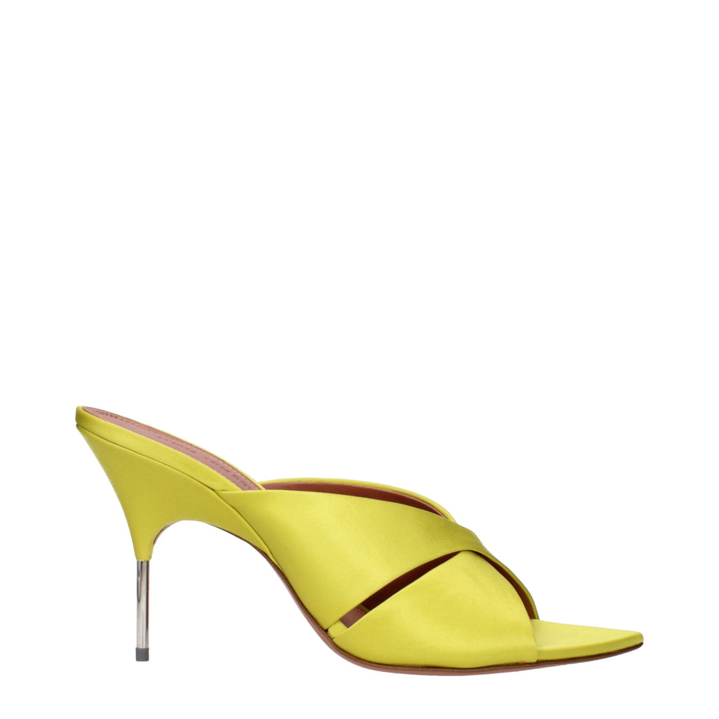 Amina Muaddi green satin stiletto heel sandals with ankle straps and pointed toes, showcasing elegant and luxurious footwear design.