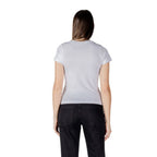 White cotton T-shirt from Guess Active with a classic fit and crew neckline, shown laid flat with subtle branding details.
