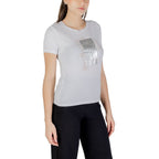 White cotton T-shirt from EA7 Emporio Armani with subtle logo detail, casual fit, and soft fabric.