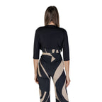 Rinascimento black polyester sleeveless jacket with high collar and sleek design, perfect for stylish layered looks.