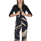 Rinascimento black polyester sleeveless jacket shown on a hanger, featuring a sleek design and smooth fabric.