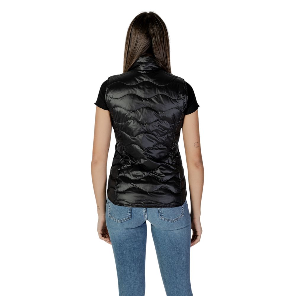 Black Blauer polyamide sleeveless jacket shown on a model, featuring a high collar and lightweight design.