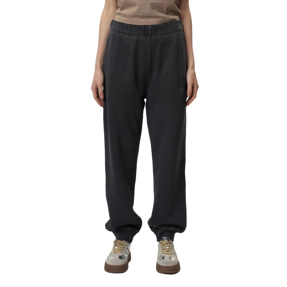 Gray cotton Calvin Klein Jeans joggers, workout pants with a relaxed fit and elastic waistband, shown on a model.