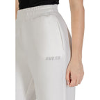 Guess Active cream viscose joggers, women's workout pants with a relaxed fit and elastic waistband, suitable for activewear and casual wear.