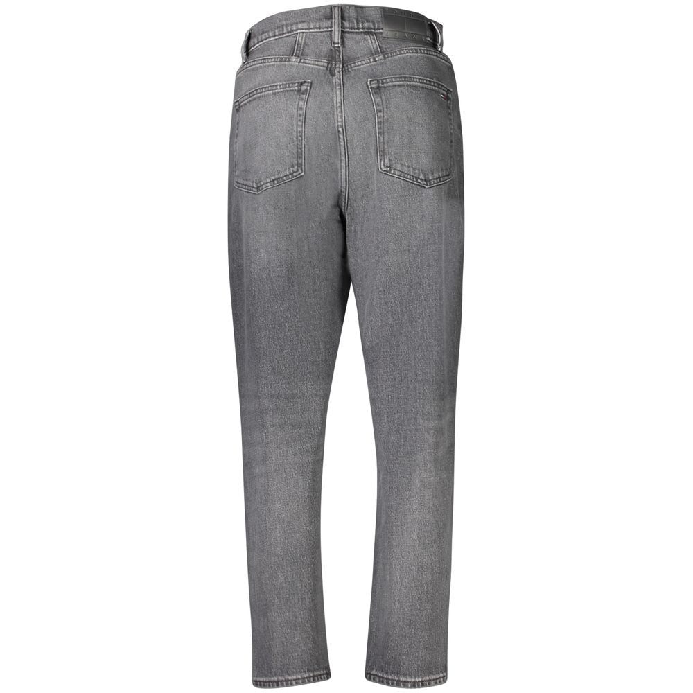 Black cotton women's jeans by Tommy Hilfiger, fitted style with classic five-pocket design, shown on a model.