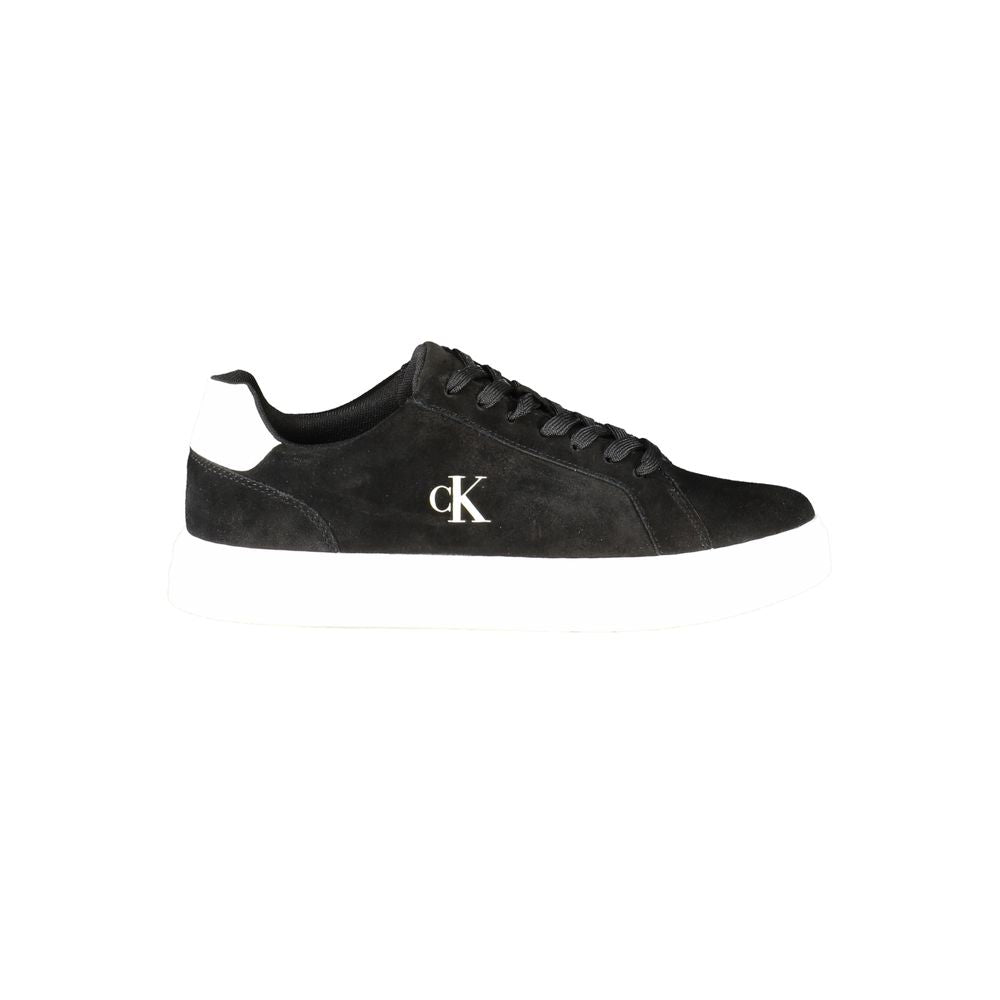 Calvin Klein black leather men's sneaker with sleek design and white sole, showcasing style and craftsmanship.