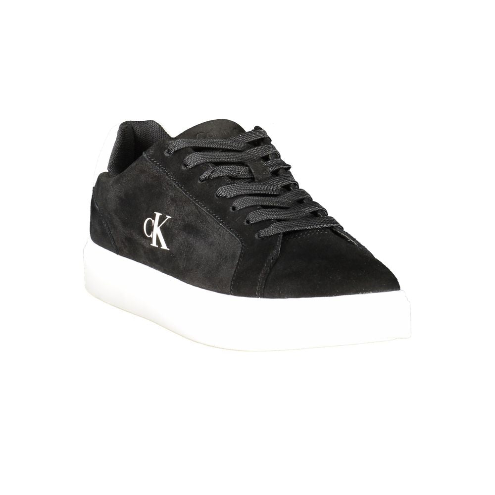 Calvin Klein black leather men's sneaker with sleek design and white sole, showcased from a side angle.