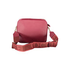 Red leather women's bag by Coccinelle with a sleek design and top handle, showcasing elegant craftsmanship and stylish details.