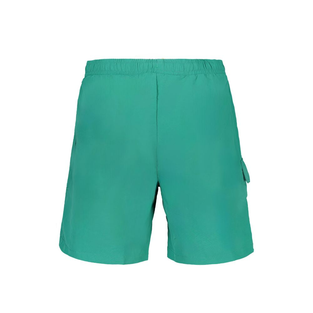 Fila Verde poliammide men's swim boxer, showcasing the snug fit and vibrant green color of the swimwear.