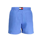 Tommy Hilfiger Azzurro poliammide men's swim trunk with elastic waistband and side pockets, blue color, casual beachwear style.