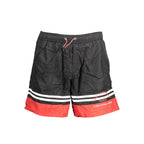 Black polyester men's swim boxer by Karl Lagerfeld with elastic waistband and brand logo, suitable for swimming and beachwear.