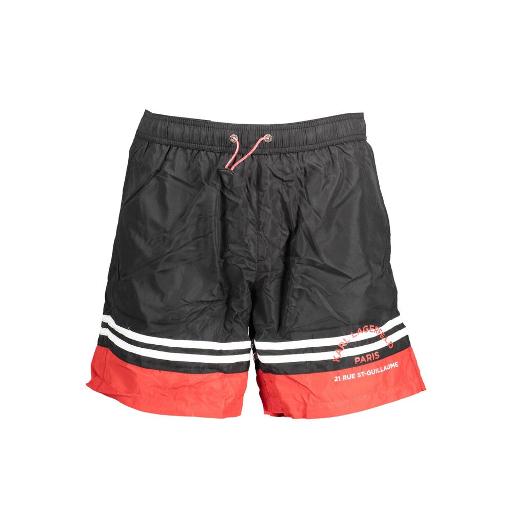 Black polyester men's swim boxer by Karl Lagerfeld with elastic waistband and brand logo, suitable for swimming and beachwear.