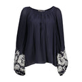 Kocca Blu Viscosa Donna Camicia featuring a lightweight, flowy blue viscose fabric with a classic button-up design.